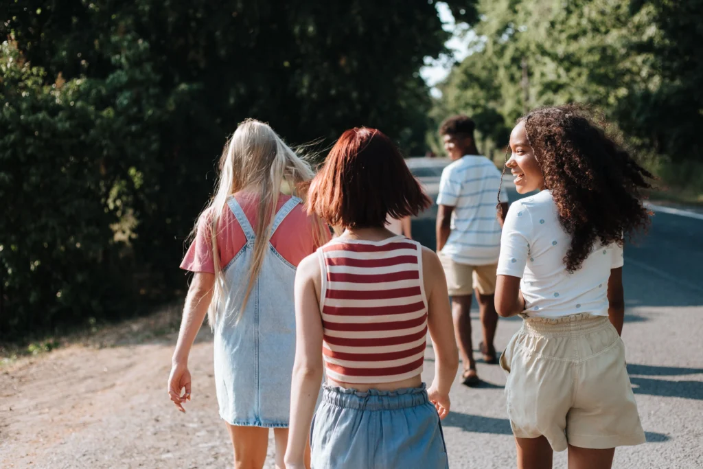 A diverse group of friends sharing a fun moment together, representing friendship dynamics, relationships, and character prompts.